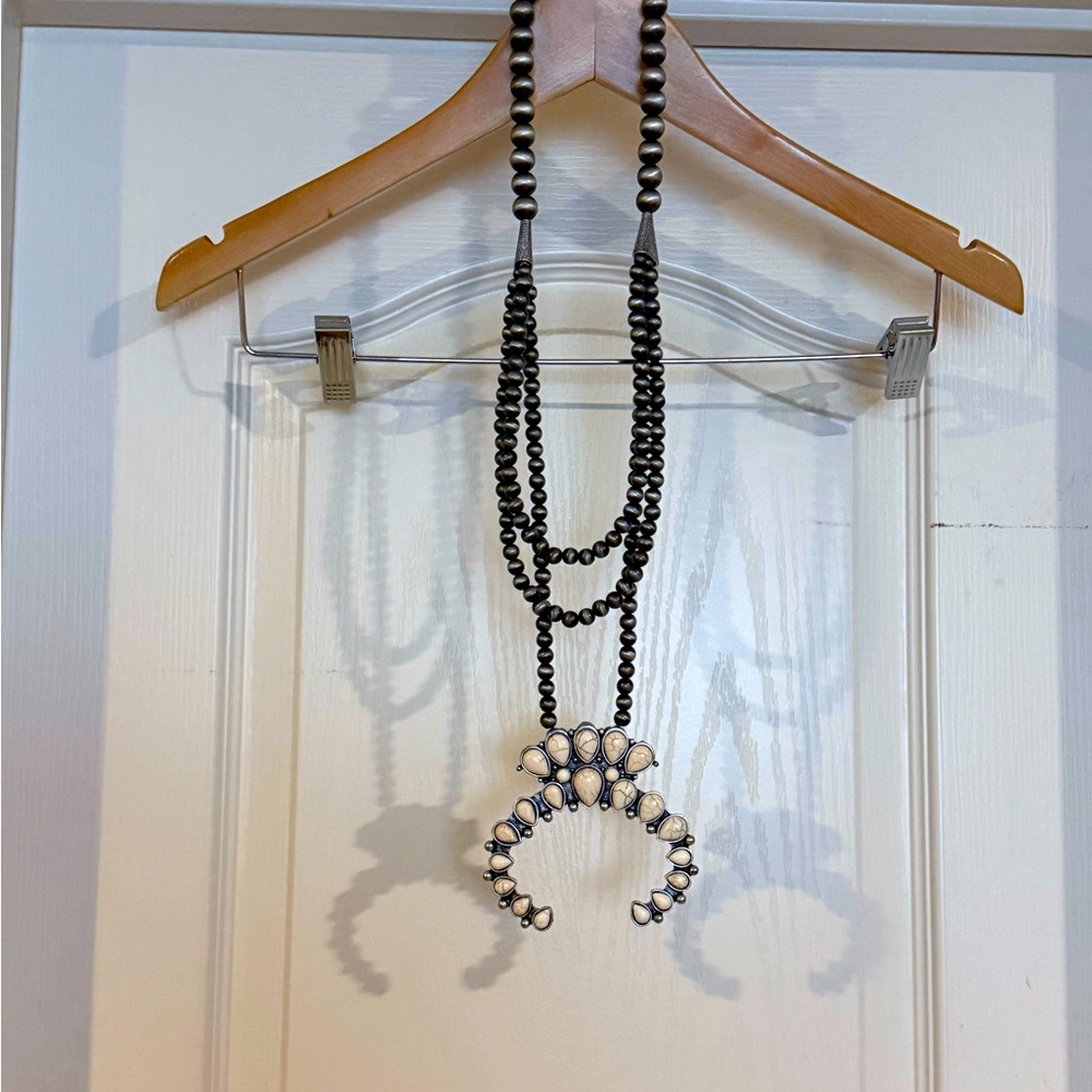 New with tags faux squash blossom.